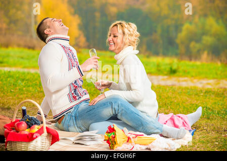 happy couple relaxing weekend on a picnic Stock Photo