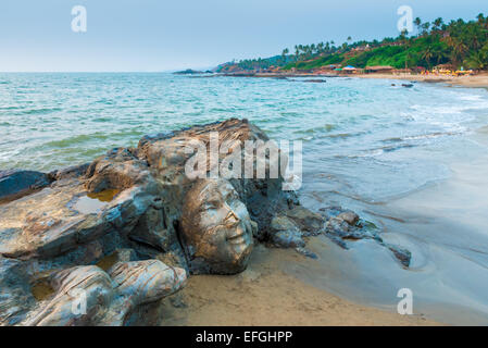 sculpture faces the Indian god Shiva Stock Photo