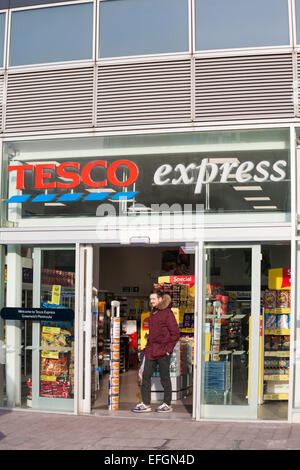 Tesco Express store, shop front exterior entrance, at Greenwich Peninsula, London, UK in February Stock Photo