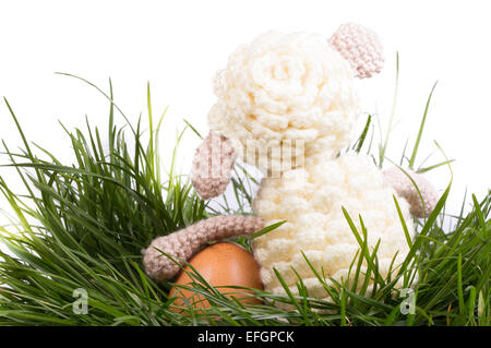easter decoration with eggs and funny crochet lamb Stock Photo