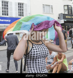 People celebrate Brighton Pride with a parade through the city featuring carnival floats  Featuring: Atmosphere Where: Brighton, United Kingdom When: 02 Aug 2014 Stock Photo