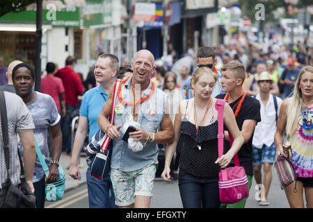 People celebrate Brighton Pride with a parade through the city featuring carnival floats  Featuring: Atmosphere Where: Brighton, United Kingdom When: 02 Aug 2014 Stock Photo