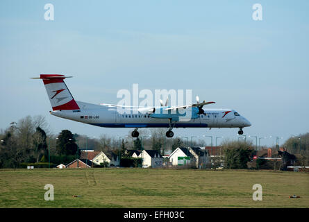 Brussels Airlines Dash 8 landing at Birmingham Airport, UK Stock Photo