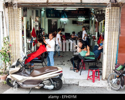 A very busy hairdressing salon in Can Tho, Vietnam. Stock Photo