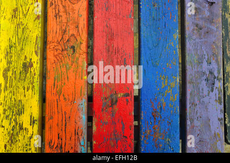 Chipped paint wood texture colorful planks weathered wooden boards abstract background. Stock Photo