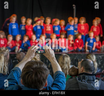 People taking pictures of children performing at the Idno Theater, Annual Children's Festival, Reykjavik, Iceland. Stock Photo