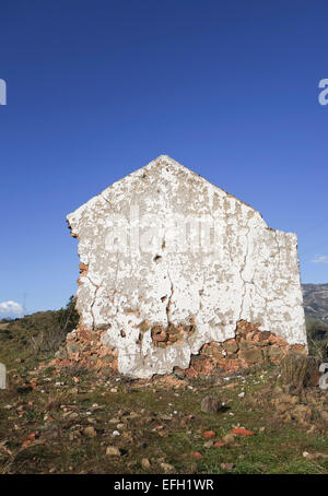 Ruin on hill of old farmhouse inland, Mountains of Mijas in background, Costa del Sol, Andalusia, Spain. Stock Photo
