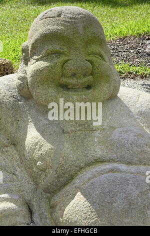 Hotei, god of happiness, at Morikami Japanese Gardens, Delray Beach, Palm Beach County, Florida Stock Photo