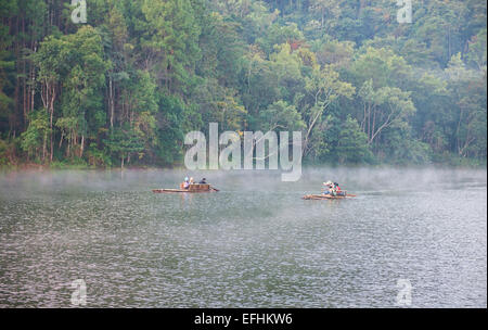 bamboo rafts in the morning mist, Pang Ung Lake, Mae Hong Son, Thailand Stock Photo