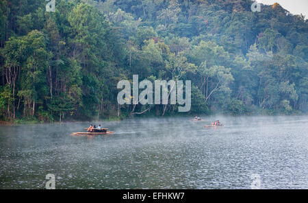 bamboo rafts in the morning mist, Pang Ung Lake, Mae Hong Son, Thailand Stock Photo