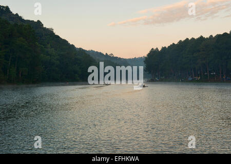 bamboo rafts in the morning mist, Pang Ung Lake, Mae Hong Son, Thailand Stock Photo