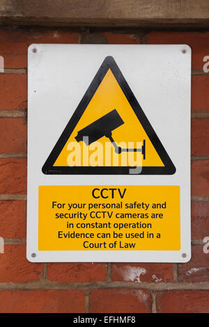 Sign on wall warning of CCTV cameras operating in vicinity Stock Photo