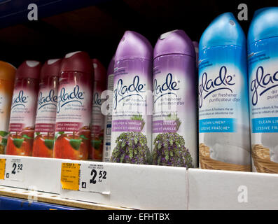 Cans of Glade brand aerosol spray air fresheners on a store shelf.  Deodorizing sprays for the home. Stock Photo