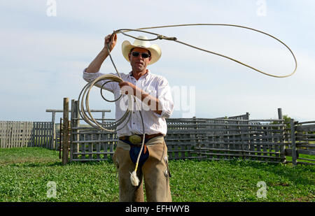 Cowboy with lasso, George Gaber, owner of La Reata Ranch, Saskatchewan, Canada Stock Photo