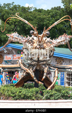 Giant spiny lobster marks the entrance to the artisan village The Rain Barrel, Islamorada, Florida Keys, Florida, USA Stock Photo