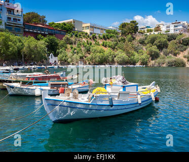 Boats on Lake Voulismeni. Agios Nikolaos, Crete, Greece Stock Photo