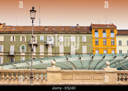 Parma, Italy - Emilia-Romagna region. contrast between colorful Mediterranean architecture and modern glass roof Stock Photo