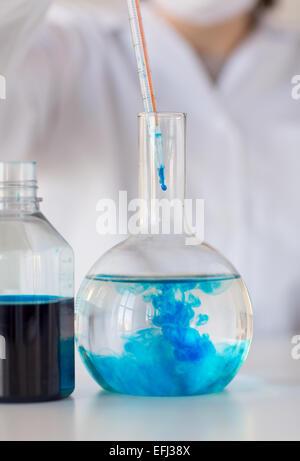 close up of scientist making test in lab Stock Photo