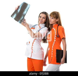 Two nurse  watching X Ray image Stock Photo