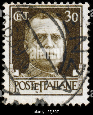 ITALY - CIRCA 1943: Stamps printed in Italy shows image of King Victor Emmanuel III of Italy, circa 1943 Stock Photo