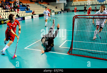 Nitra, Slovakia. 5th Feb, 2015. Left to right: Michaela Mlejnkova (CZE), goalkeeper Alberta Franco (ITA) and Laura Mangarelli (ITA) in action during women floorball World Championship qualification match Czech Republic vs Italy in Nitra, Slovakia, on Thursday, February 5, 2015. © Jan Koller/CTK Photo/Alamy Live News Stock Photo