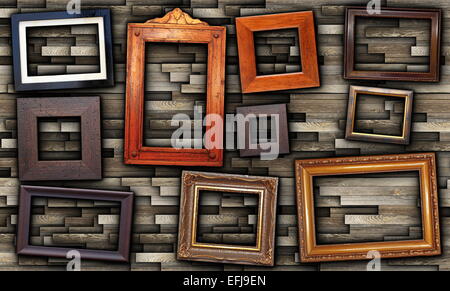 abstract arrangement of wooden  frames on grungy wall Stock Photo
