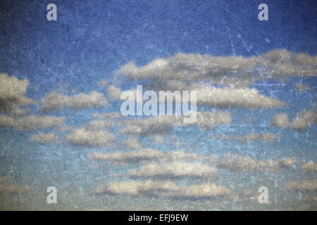 abstract blue sky backdrop with scratches resembling old painting ( it is made from two pictures I took ) Stock Photo