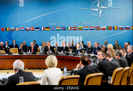 (150205) -- BRUSSELS, Feb. 5, 2015 (xinhua) -- NATO Secretary General Jens Stoltenberg (2nd L, C) speaks during the NATO defense ministers meeting at the Alliance headquarters in Brussels, capital of Belgium, Feb. 5, 2014. NATO Defense Ministers gathered here on Thursday to discuss the implementation of the Readiness Action Plan and the Ukraine crisis. (Xinhua/Zhou Lei) Stock Photo