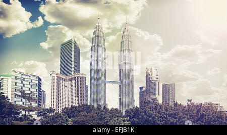 Retro vintage filtered picture of Kuala Lumpur skyline.