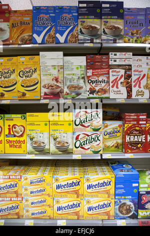 Cereals for sale in a UK supermarket, including Kellogs, own brand ...