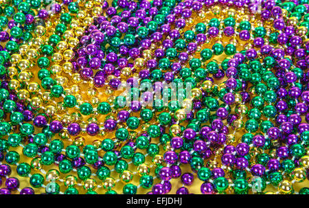 Colorful Mardi Gras beads background Stock Photo