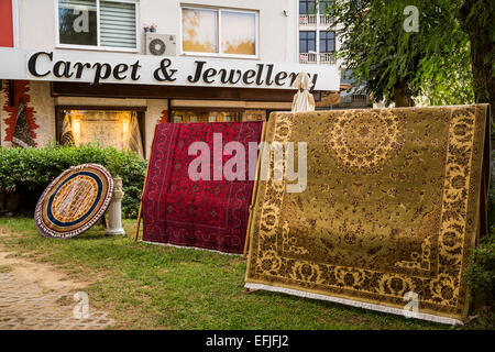 An outdoor display of Turkish carpets in Kusadasi, Turkey, Eurasia. Stock Photo
