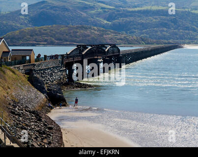 Barmouth Bridge or Viaduct Pont Abermaw a largely wooden structure over the Mawddach Estuary in Gwynedd North Wales opened 1867 Stock Photo