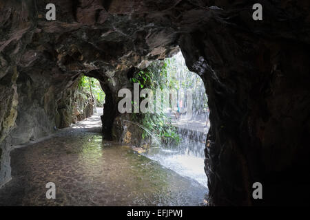 Singapore Botanic Gardens. Man made waterfall and cave. Stock Photo