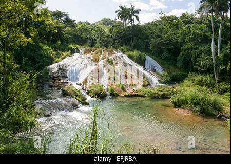 One of the lower falls of El Nicho located on the Hanabanilla River, in the Escambray Mountains, Cienfuegos Province, Cuba. Stock Photo