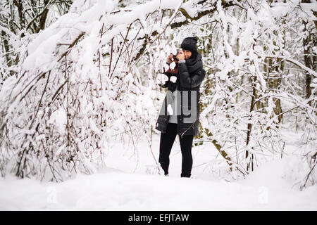 Girl photographed in snowy forest Stock Photo