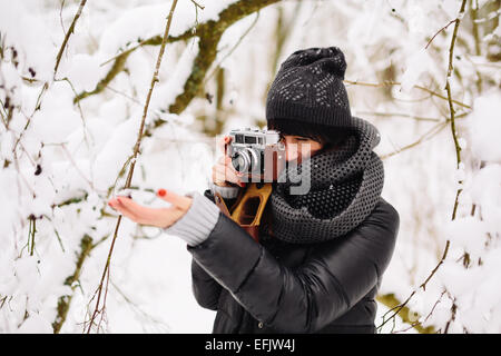 Girl photographed in snowy forest Stock Photo