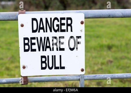 Danger beware of the bull sign on farm gate, Burren, County Clare, Ireland Stock Photo