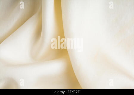 White background abstract cloth wavy folds of textile texture wallpaper design of elegant fabric silk Stock Photo