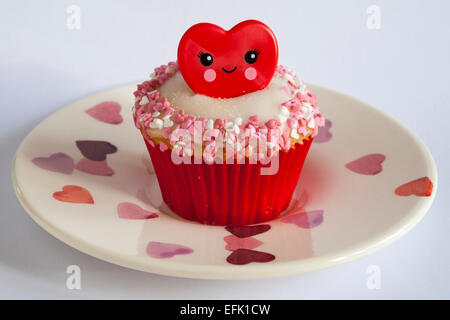 Valentine red ring cupcake set on heart plate isolated on white background - ideal for valentines day, valentine day Stock Photo