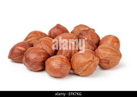 Heap of peeled hazelnuts isolated on white Stock Photo