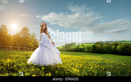 Beautiful bride in the outdoors - idyllic Stock Photo