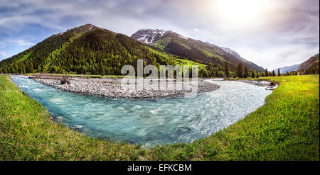 Mountain river panorama in the valley with green grass in Dzungarian Alatau, Kazakhstan, Central Asia Stock Photo