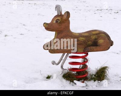 Childrens play furniture in snow covered ground on the Gleniffer Braes, Paisley, Scotland, Uk Stock Photo