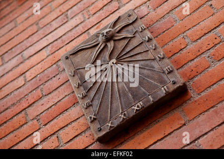 Sundial on a brick wall Stock Photo