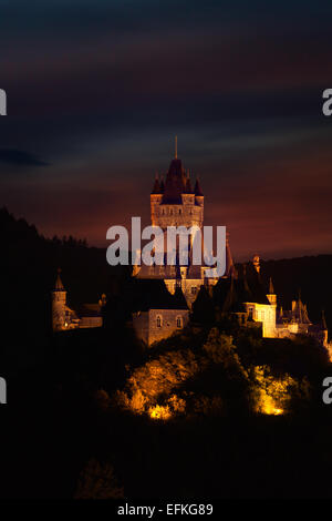 View of Cochem castle at the evening over dark sky Stock Photo