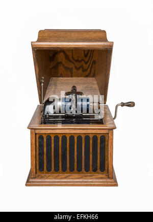 Vintage tabletop cylinder phonograph circa 1920.  Blue celluloid cylinder.   Isolated on white. Stock Photo