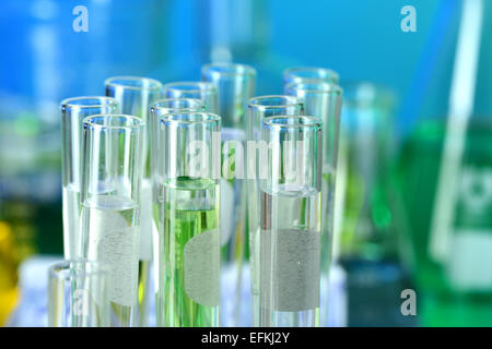 Test tubes with fluids in laboratory Stock Photo