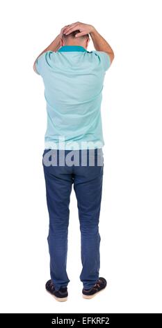 Back view of angry young man in jeans and shirt. Rear view. isolated over white. backside view of person. Rear view people collection. Isolated over white background. Stock Photo