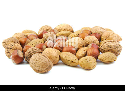 Mixed nuts, walnuts, almonds and hazelnuts on white background Stock Photo